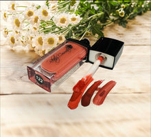 Load image into Gallery viewer, Creamy Soft Long Lasting Matt Lipstick. Bold and long wearing colors that dry with a Matte highly pigmented finish. Nourishing ingredients like Vitamin E and Avocado Oil keep lips hydrated and smooth.
